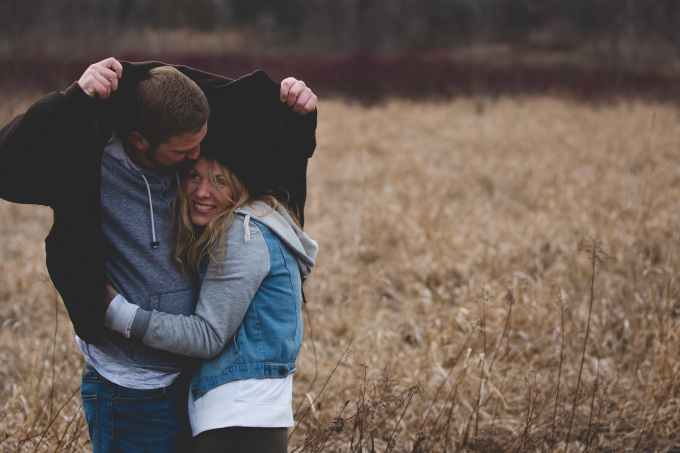 photo of couple at the field